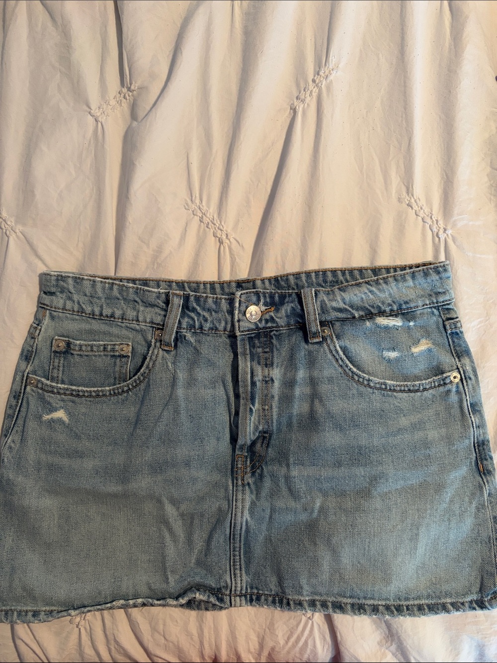 ZARA Light Wash Denim Mini Skirt with Subtle Distressing